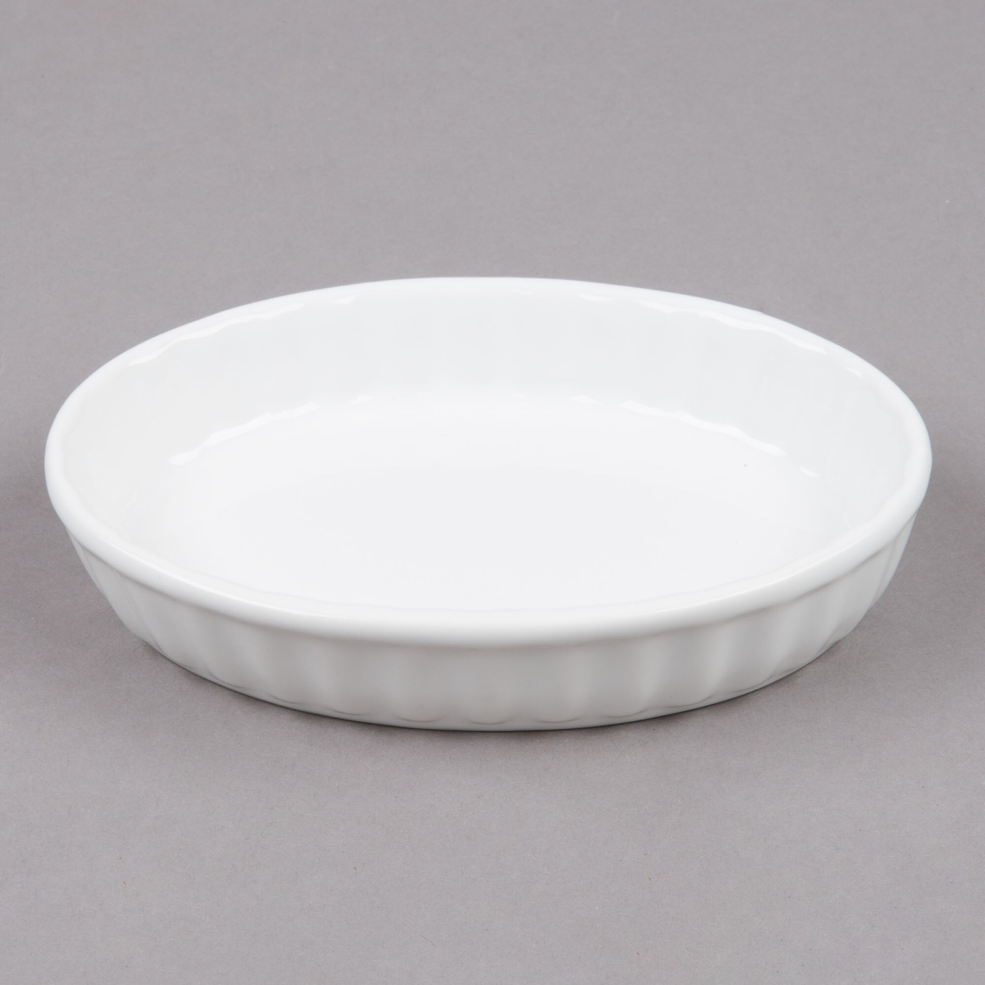 Tuxton BWK0602 6 oz. White Oval Fluted China Souffle / Creme Brulee