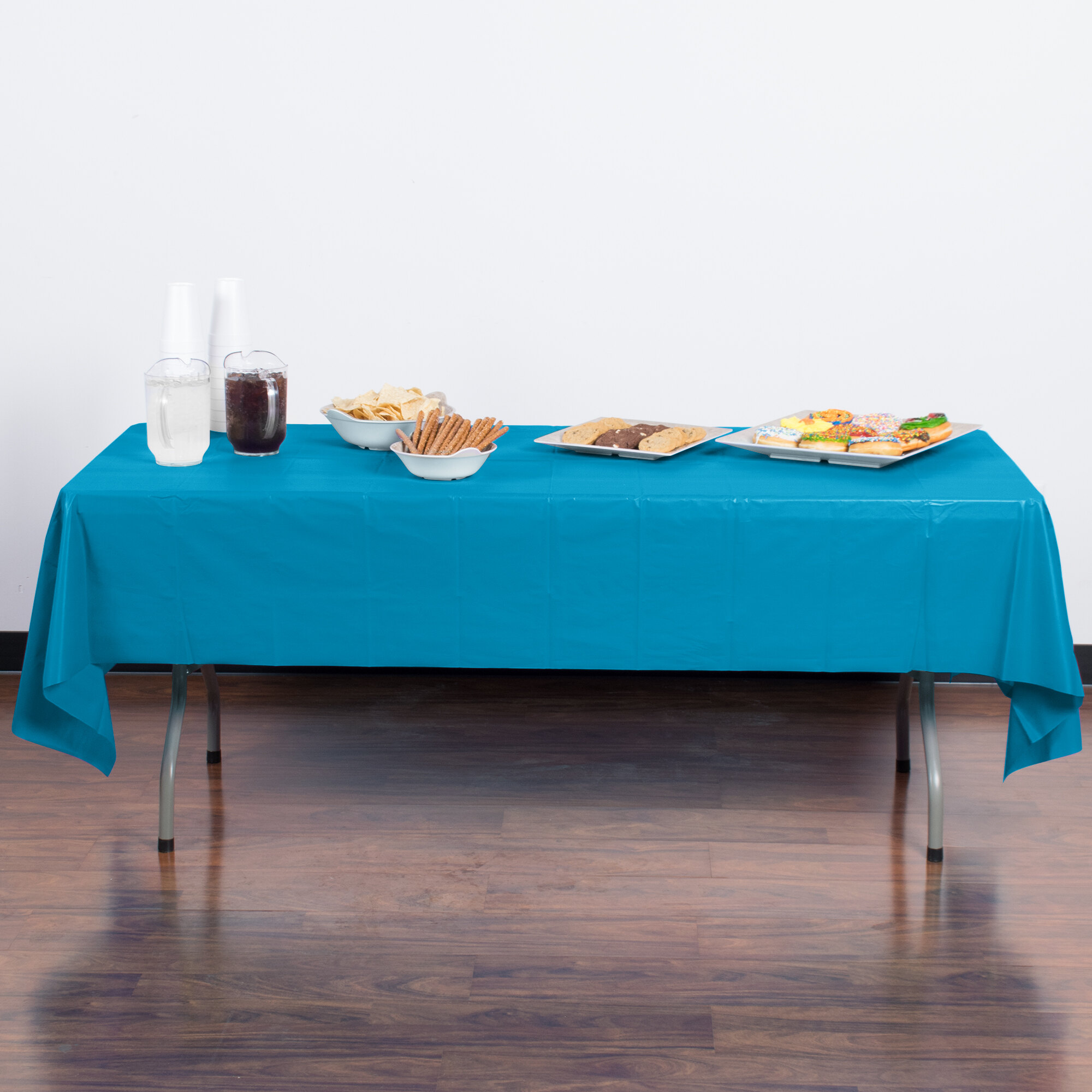 Creative Converting 723131 54" x 108" Turquoise Blue Plastic Table Cover
