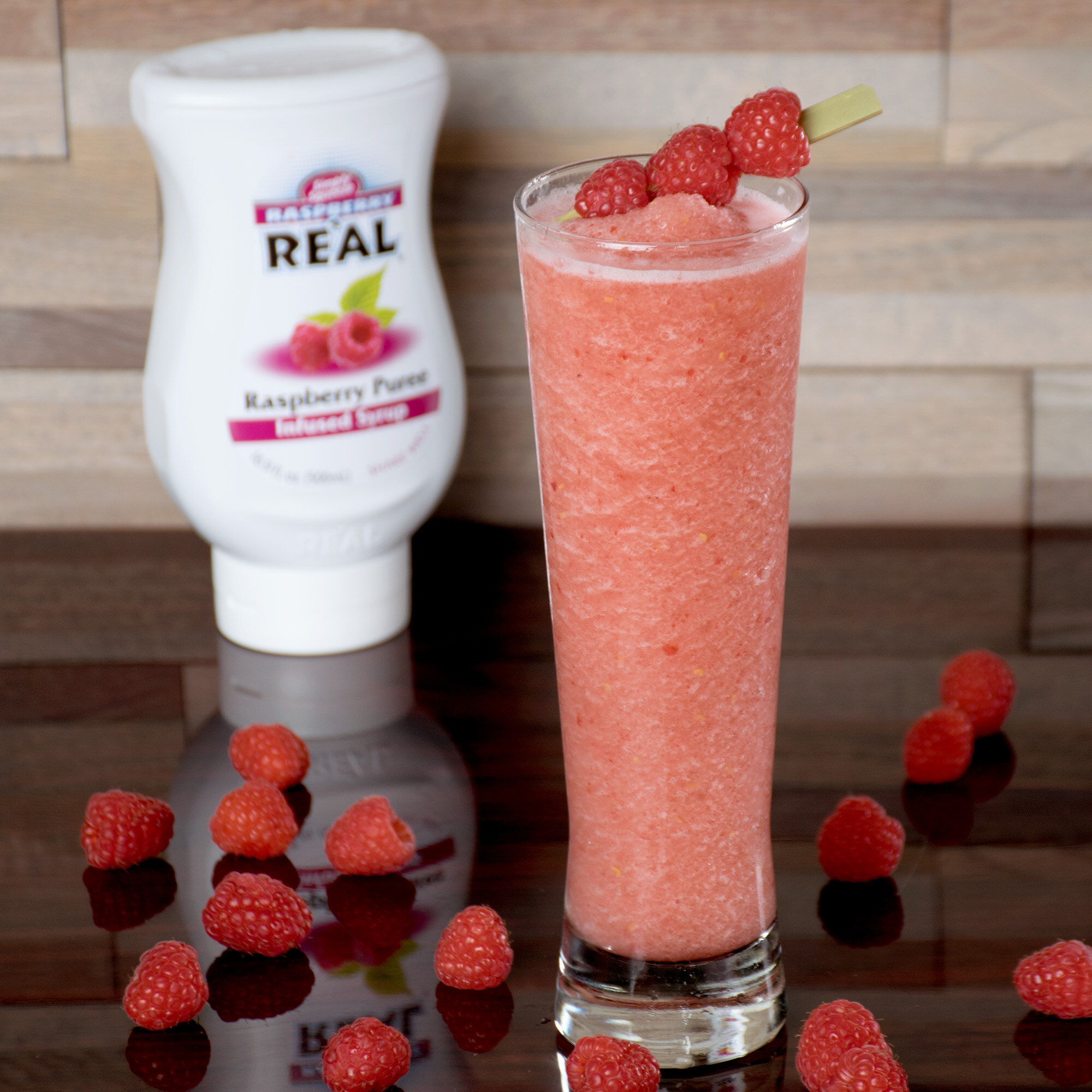 Real 16.9 fl. oz. Raspberry Puree Infused Syrup