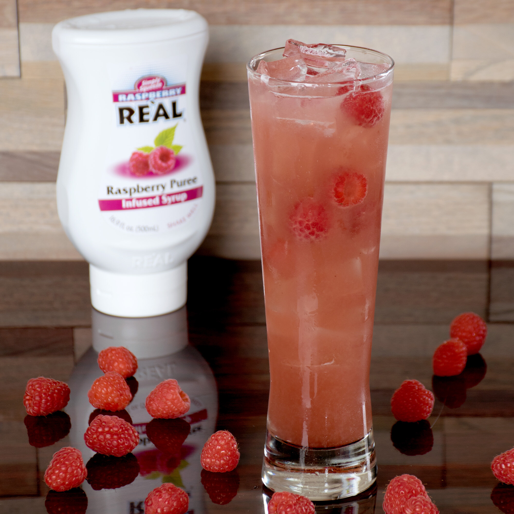 Real 16.9 fl. oz. Raspberry Puree Infused Syrup
