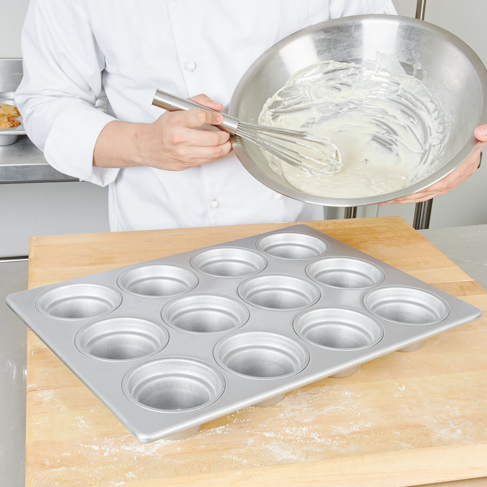 12 Cup 7.33 oz. Glazed Aluminized Steel Jumbo Crown Muffin Pan 13 1/8