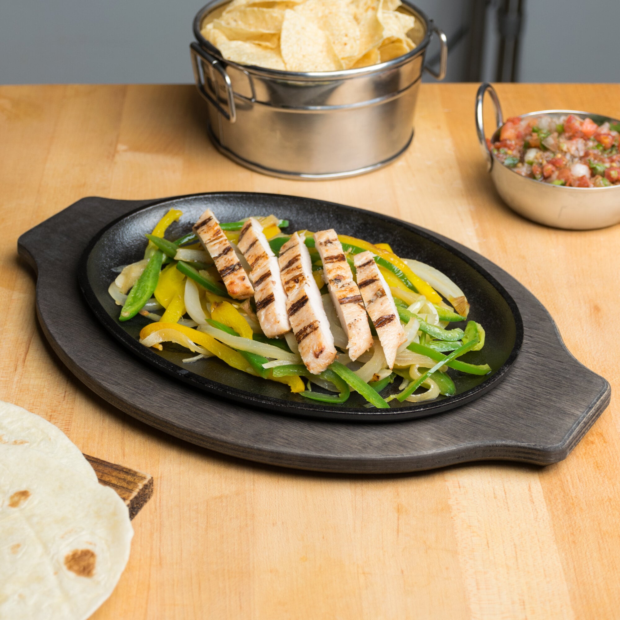 Lodge 10" x 7" Oval PreSeasoned Cast Iron Fajita Skillet with Grip