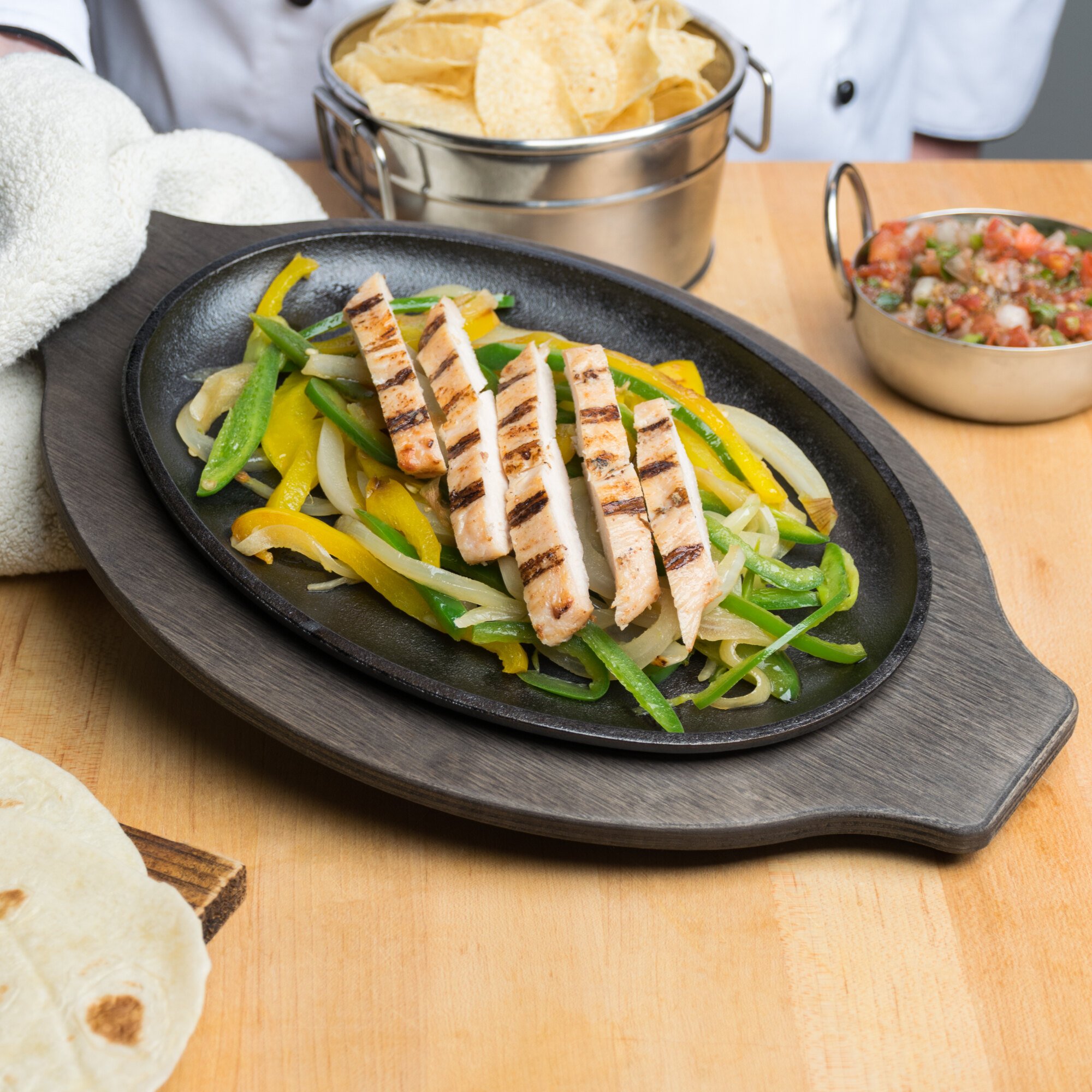 Lodge 10" x 7" Oval PreSeasoned Cast Iron Fajita Skillet with Grip