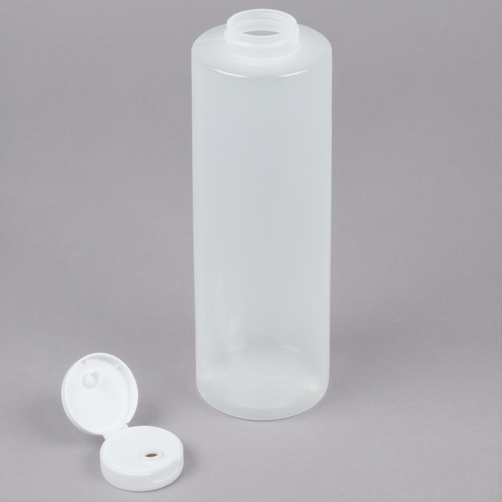 Tablecraft 2124C1 24 oz. Clear Squeeze Bottle with 38 mm Flip Lid 12