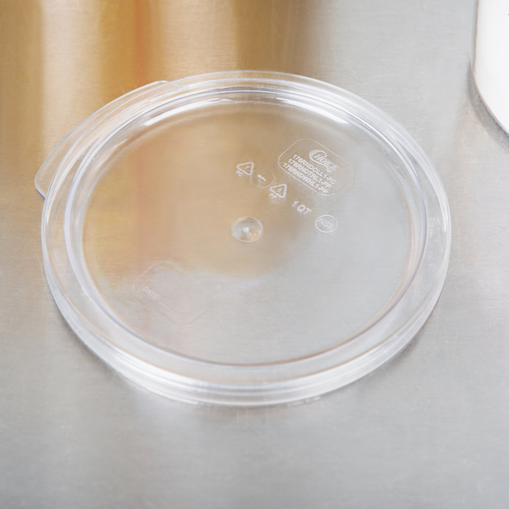 clear round plastic container and lid