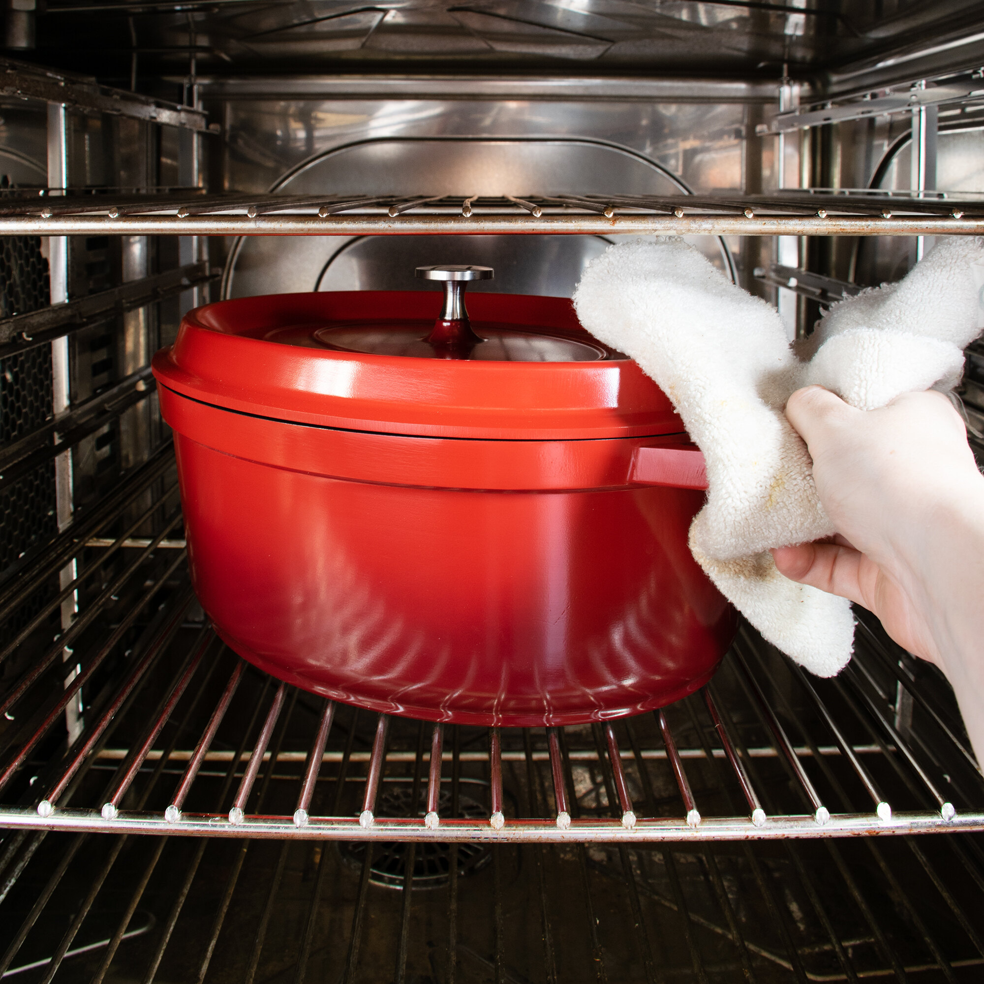 GET CA007R/BK Heiss 6.5 Qt. Red Enamel Coated Cast Aluminum Oval