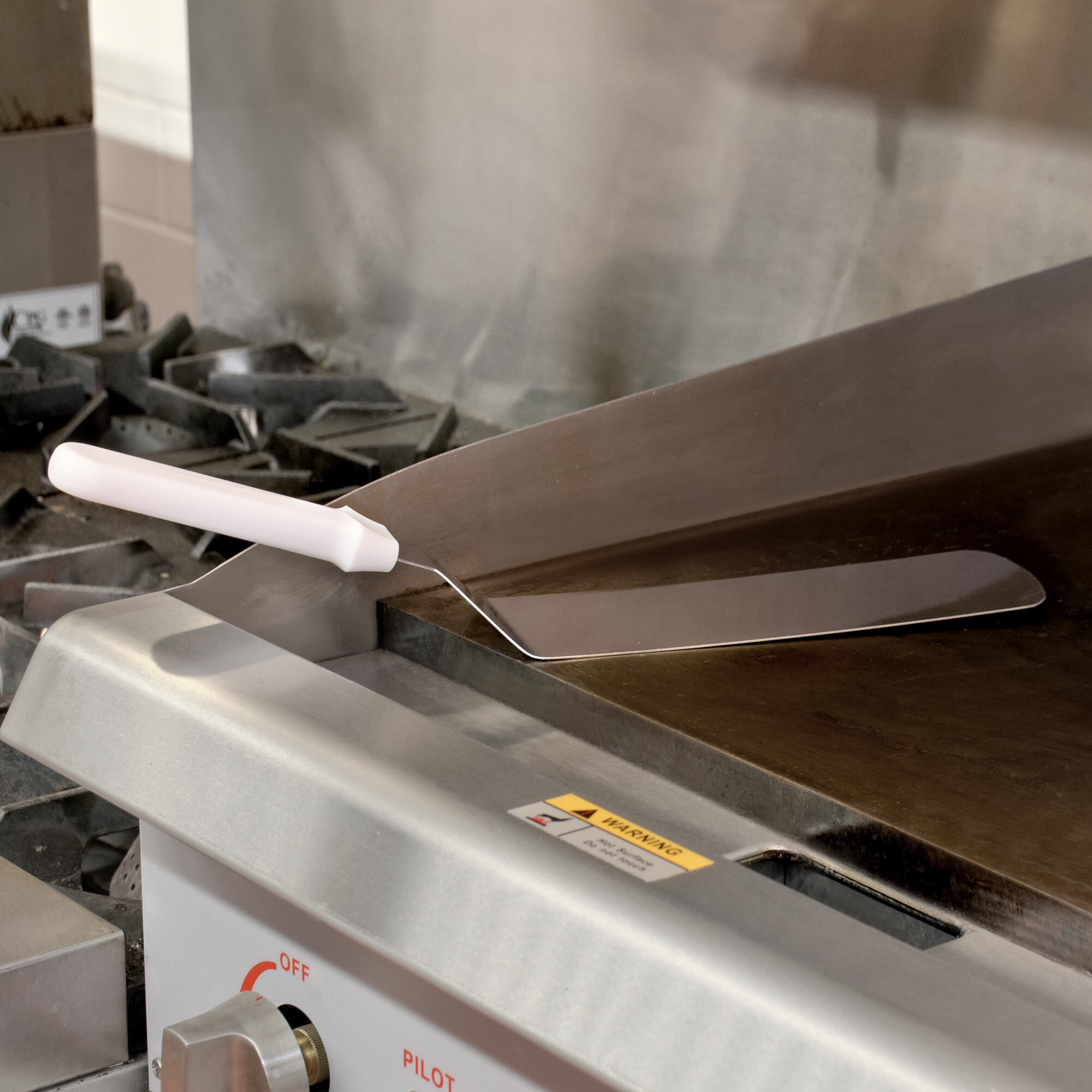 8 1/2" x 3" Solid Turner with Round Blade and White Plastic Handle