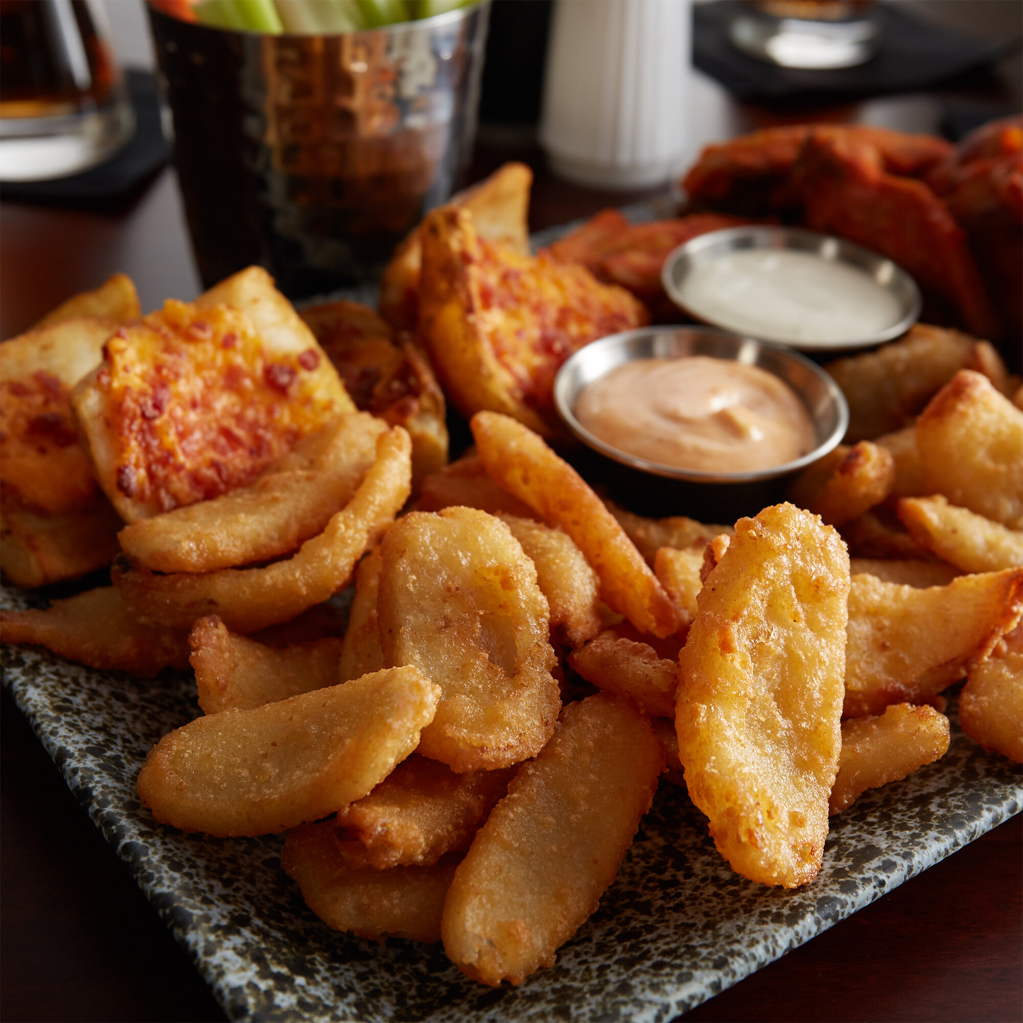 Moore's Frozen Battered Onion Petals 2.5 lb. Bags (9/Case)