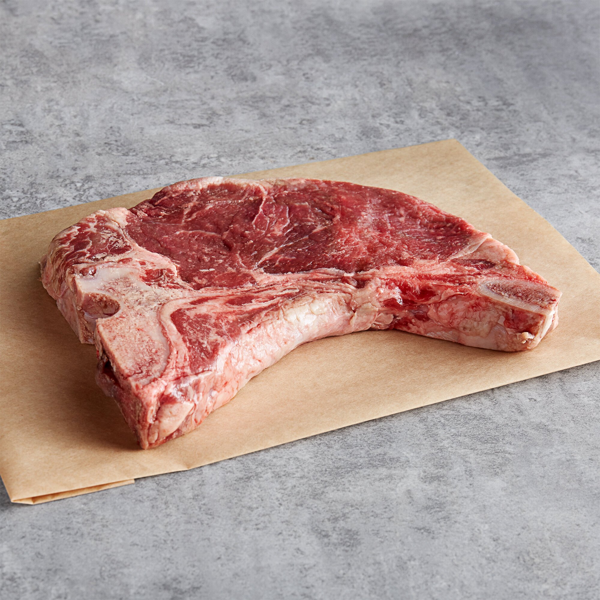 Warrington Farm Meats 14 oz. Frozen TBone Steak 12/Case