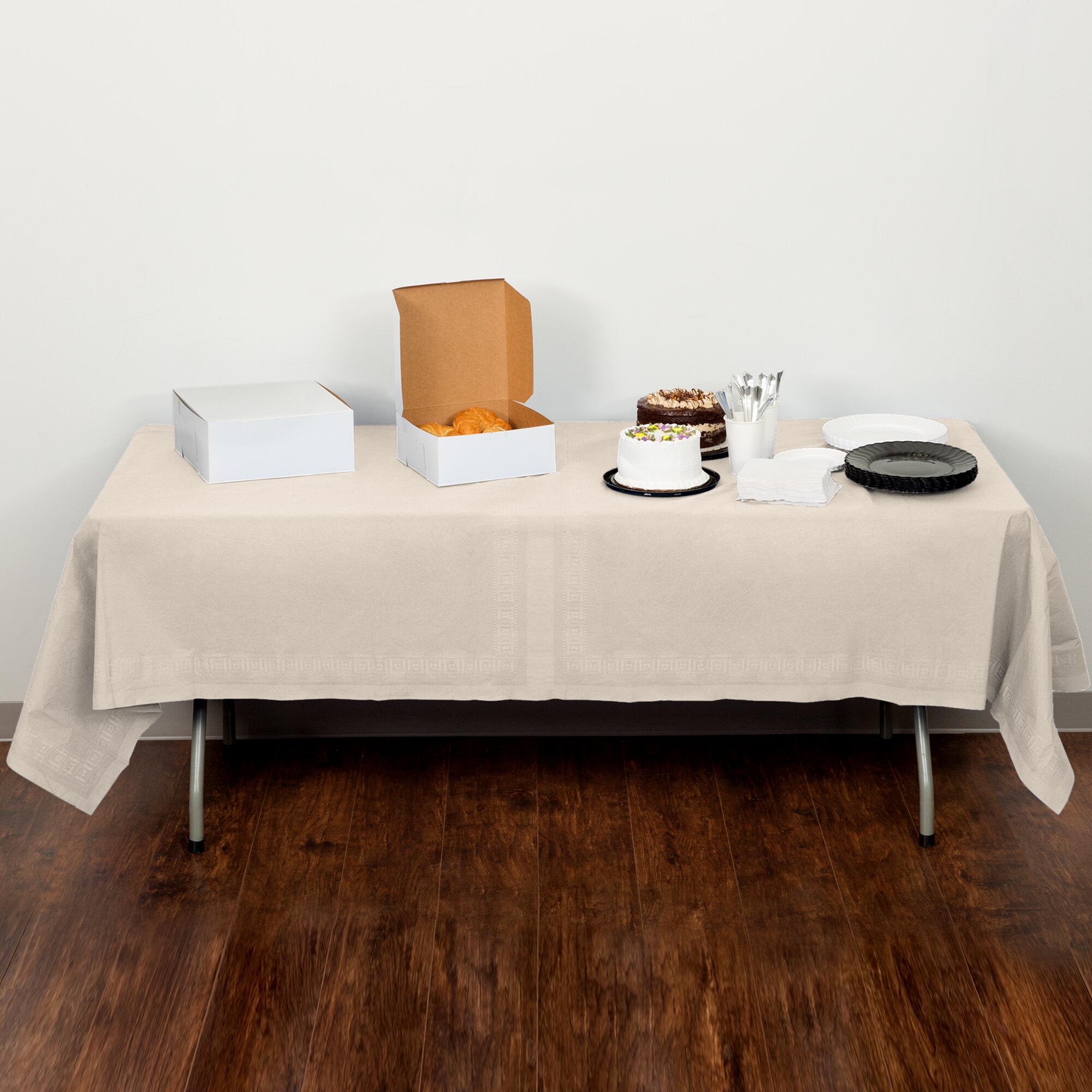 Creative Converting 710207B 54" x 108" Ivory Tissue / Poly Table Cover