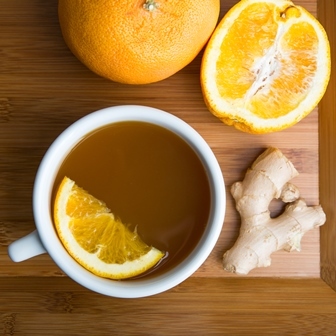 Hot apple cider with orange and ginger