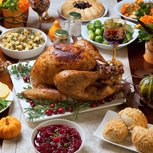 thanksgiving turkey dinner on set table