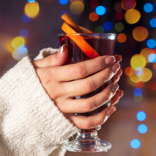 girl holding glass of wine