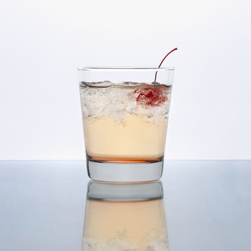 cocktail with a cherry in a rocks glass