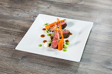 steak dinner plated using the free form plating method