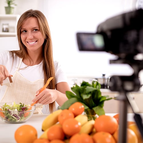 Woman filming a cooking video