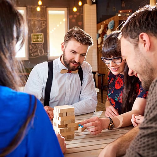 Customer playing Jenga Bar Game