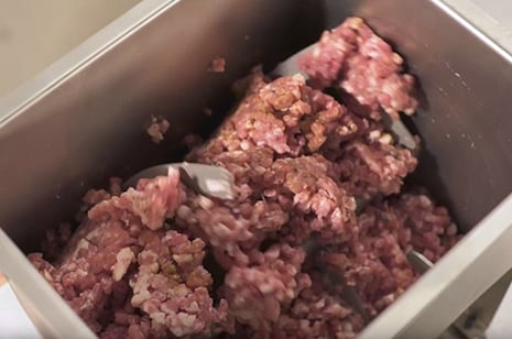 ground meat in a meat mixer