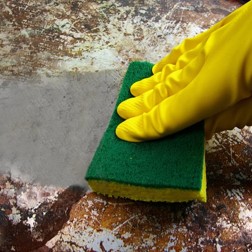 Cleaning Stainless Steel Pan with sponge