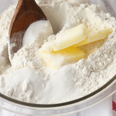 Caster sugar added to flour and butter