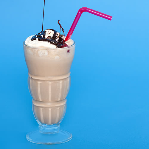 Chocolate malt milkshake with pink straw