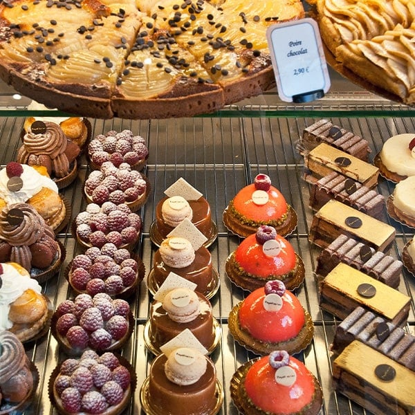 A Bakery Display Case with Lots of Colorful Pastries
