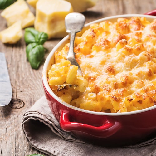 mac and cheese in red bowl