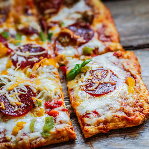 St. Louis pizza on wooden table