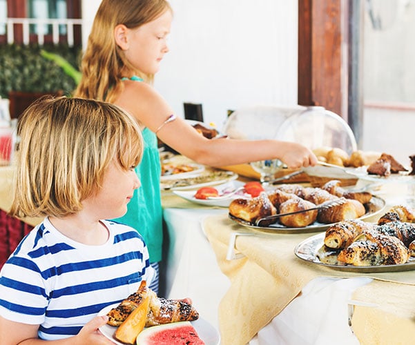 Children enjoying Continental Breakfast