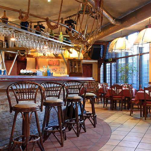 Restaurant bar with chairs and tables