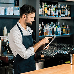 Bartender taking inventory