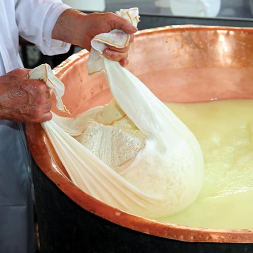 how parmesan cheese is made