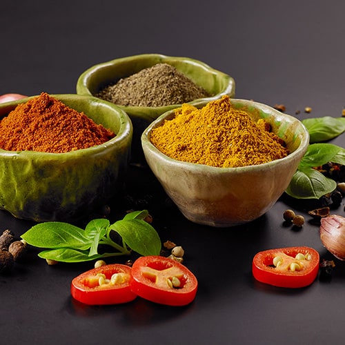 Three types of curry powder in bowls
