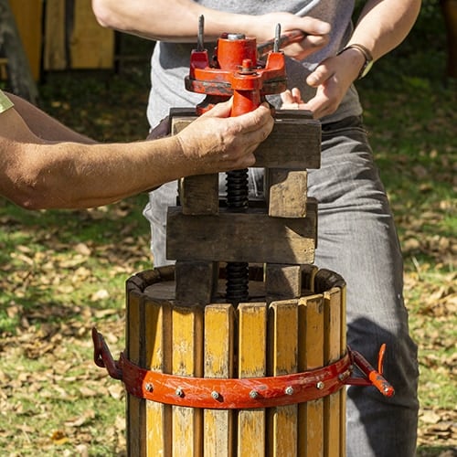 hard cider press with red detailing