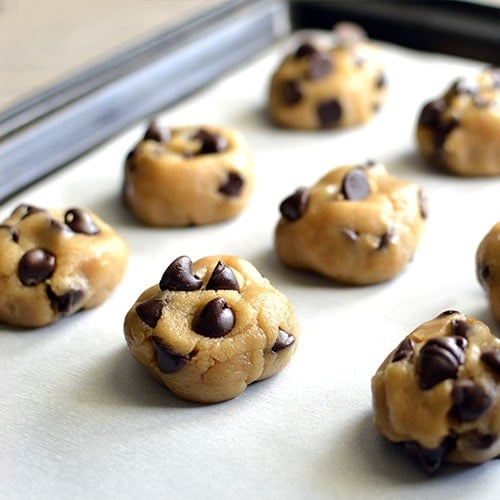 Cookie dough on a cookie sheet ready to bake