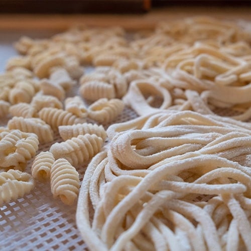Freshly made pasta coated in flour