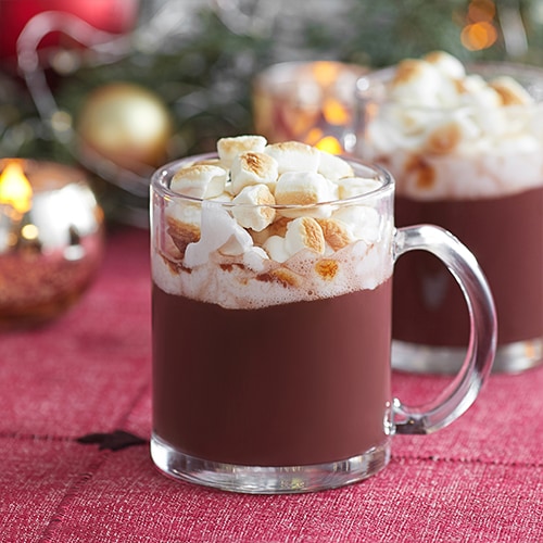 A glass of Peppermint Hot Cocoa with marshmallows.