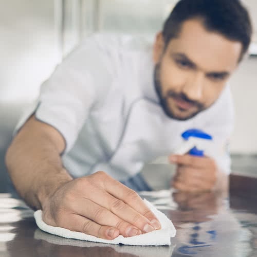 Chef Cleaning in the Kitchen