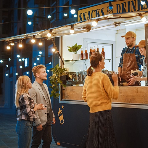 people buying food from food truck