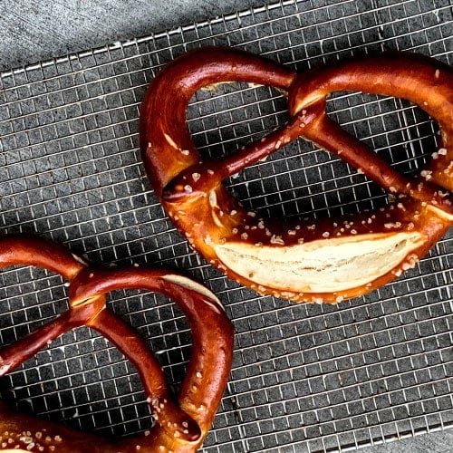 two large cooked soft pretzels