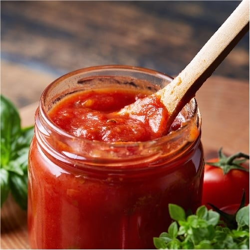 The Chef Mixes the Sauce in a Saucepan Using the Whisk. Master