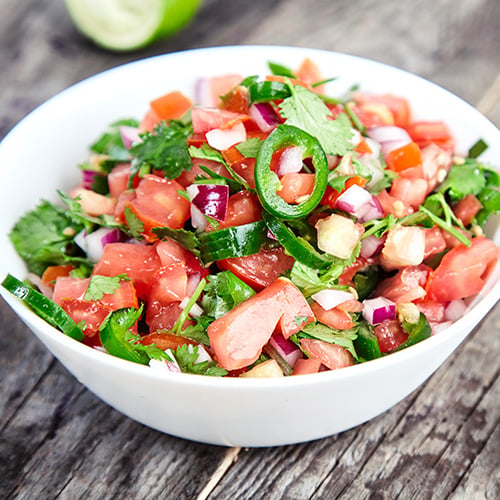 Pico de gallo in white ceramic bowl