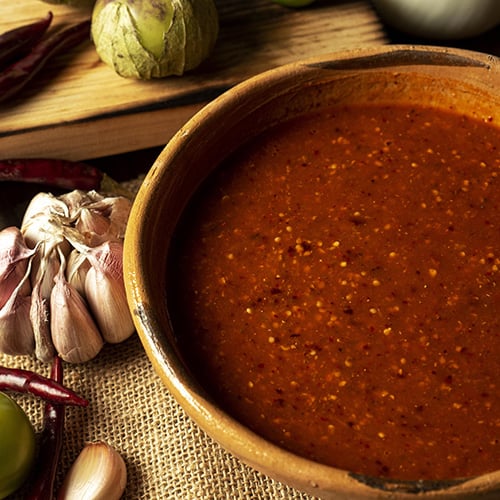 Red salsa for tacos in a mexican kitchen