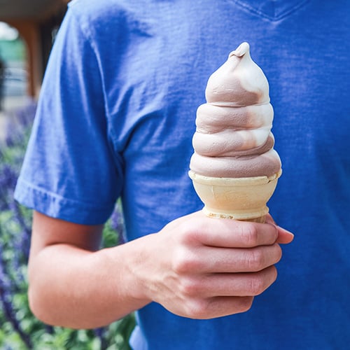 Man holding Frozen Custard cone