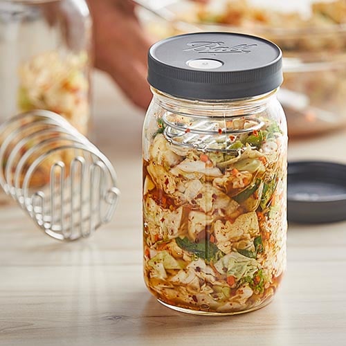 mason jar filled with fermented vegetables