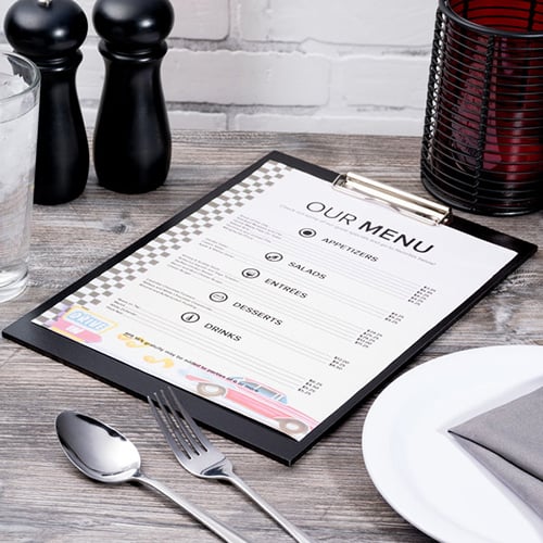 printed paper menu on clipboard