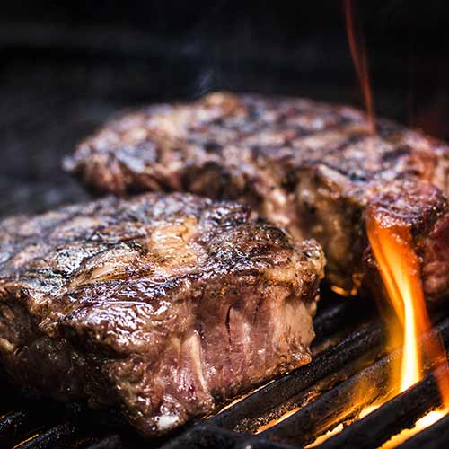 barbecue ancho steak on grill