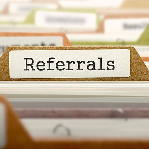 file folder labeled as referrals