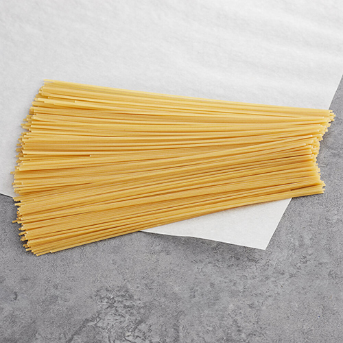 uncooked pasta on paper towel