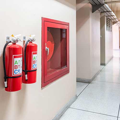 fire extinguisher system on the wall background